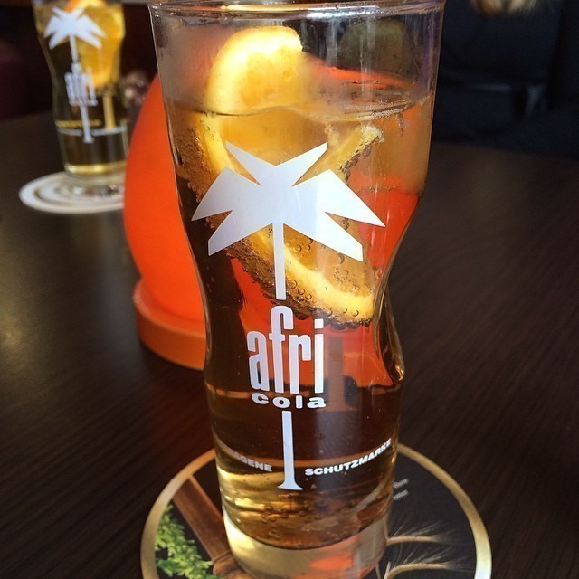 Drink :) Afri Cola. It’s actually “Fassbrause” – and don’t ask me for the English term :)