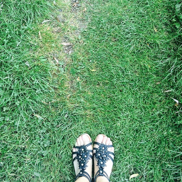 Feet on grass.