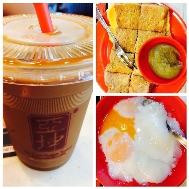 Traditional Singaporean breakfast: French toast with Kaya, soft eggs and in this case iced coffee. #singap