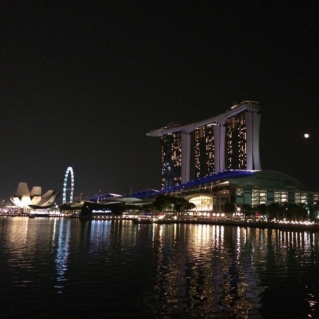 Believe it or not the white dot is the moon over Marina Bay. #randompost