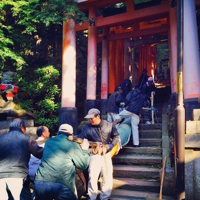 These guys are trying to lift one of the wooden stelae up the steps to replace it somewhere along the track. All manual work and listening to their chatter extremely heavy!
