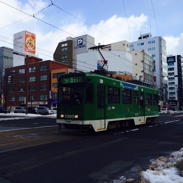 There seems to be a red and a green tram in Sapporo. #Japan