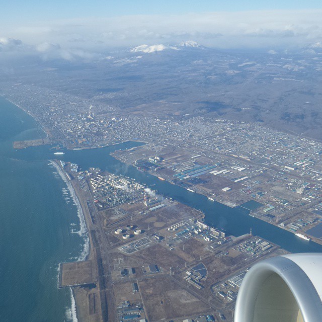 Snow capped mountains of Hokkaido in the background. #Japan