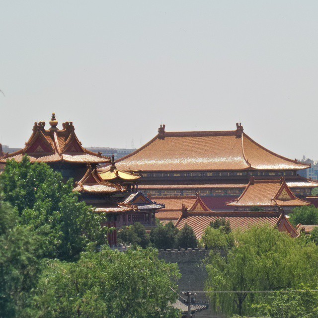 View across to the forbidden city with its gold shimmering roofs. #beijing