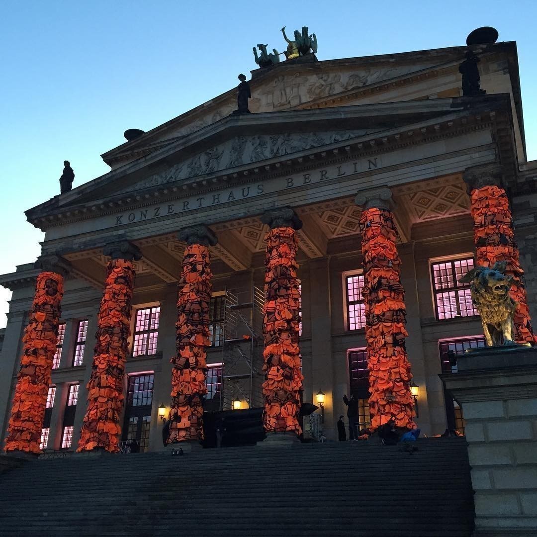 Ai WeiWei @aiww Memorial for refugees with 14k lifejackets Berlin Gendarmenmarkt 14.000 Discarded life vests of refugees crossing th