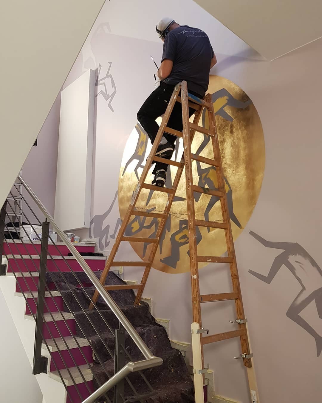 Work in progress: street artists decorating our office #art