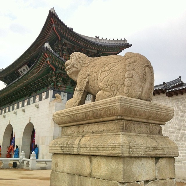 The famous gate north of the square.