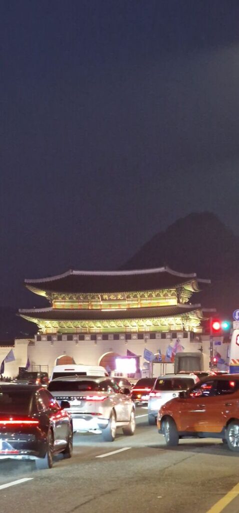 Gwanghwamun Gate at night with an always busy road. #Seoul